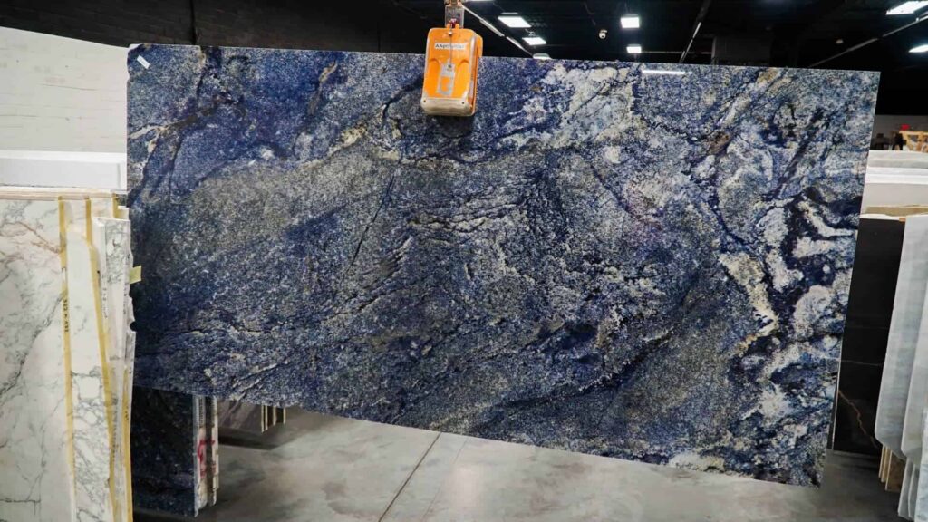 Blue Bahia granite slab with deep blue and white veining on display.